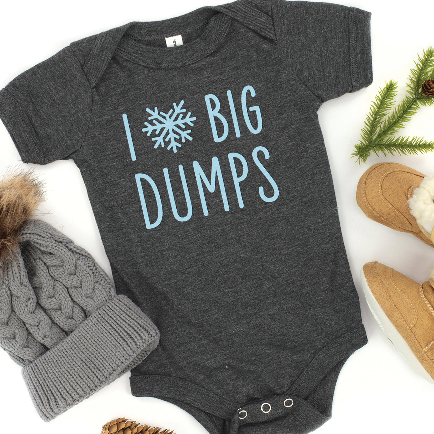i love big dumps heart shaped snowflake print on dark grey baby onesie for ski lovers